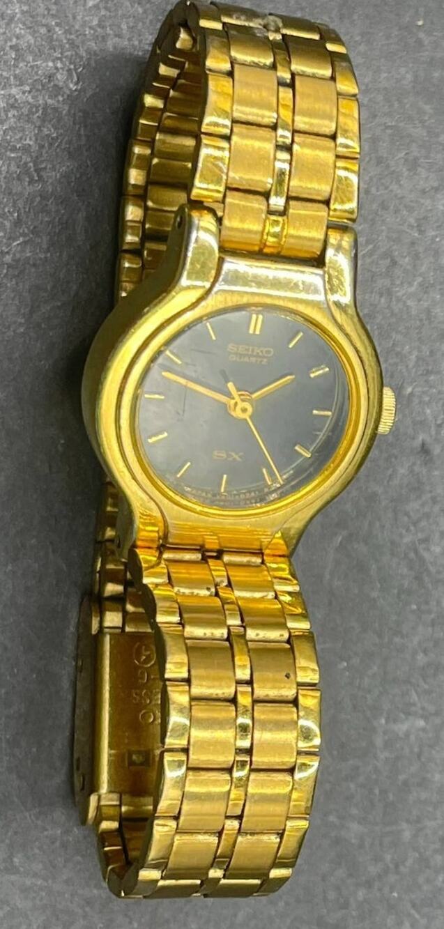 Seiko SX V401-0091 Womens Quartz Wristwatch Gold Tone Black Dial Vintage